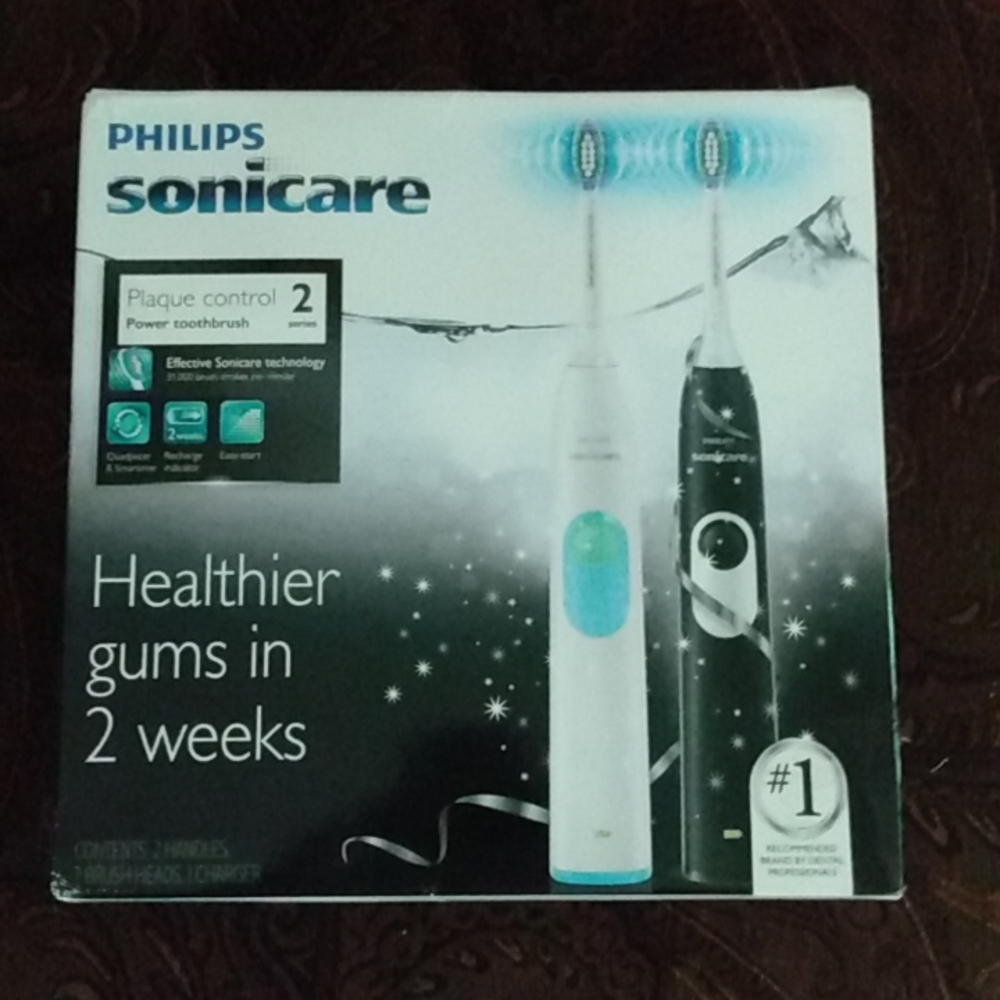 Dual handle electric toothbrush